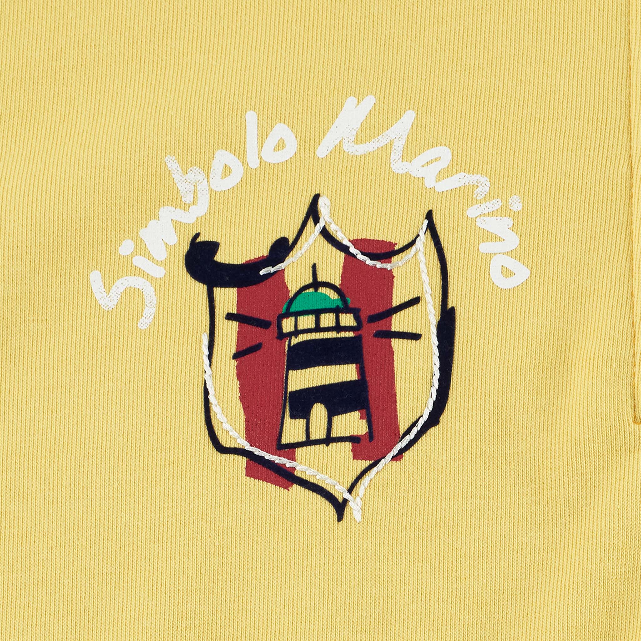 【公式】シナコバ (SINA COVA) ハーフジップトレーナー 22110010 イエローのプリント部分