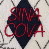 【公式】シナコバ （SINA COVA） ジップアッププルオーバー 21220070 ホワイトの刺繍拡大